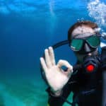 scuba diver protected by a high risk activity life insurance policy