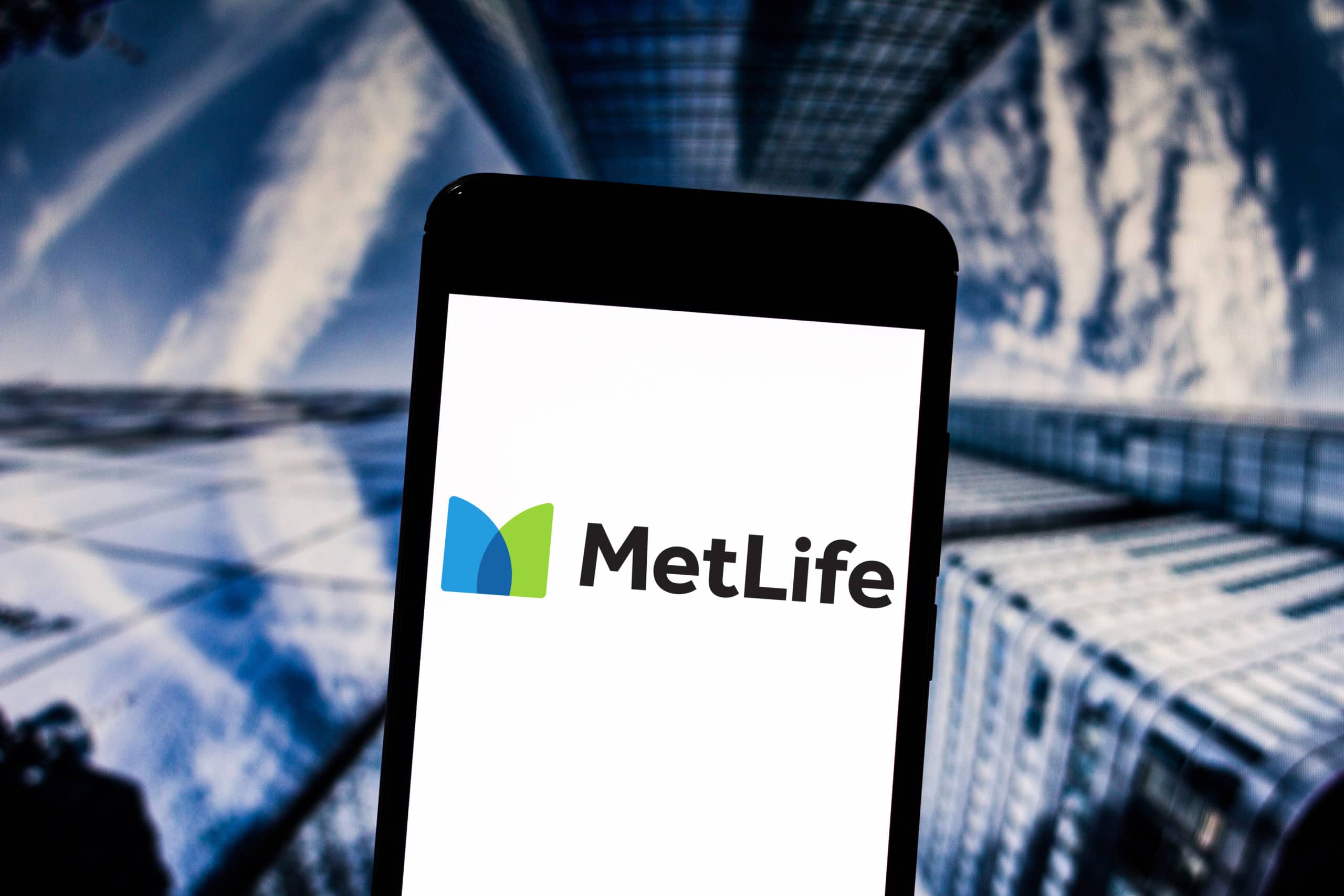 the MetLife logo is displayed on the screen of the mobile device.