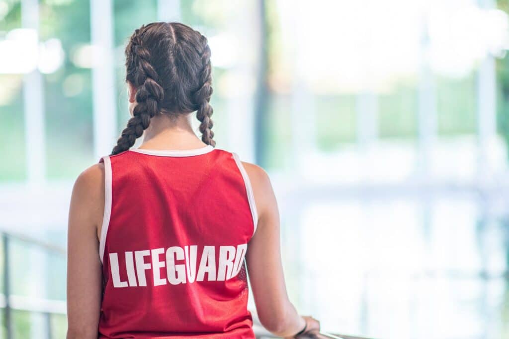 female lifeguard looking away from the camera 