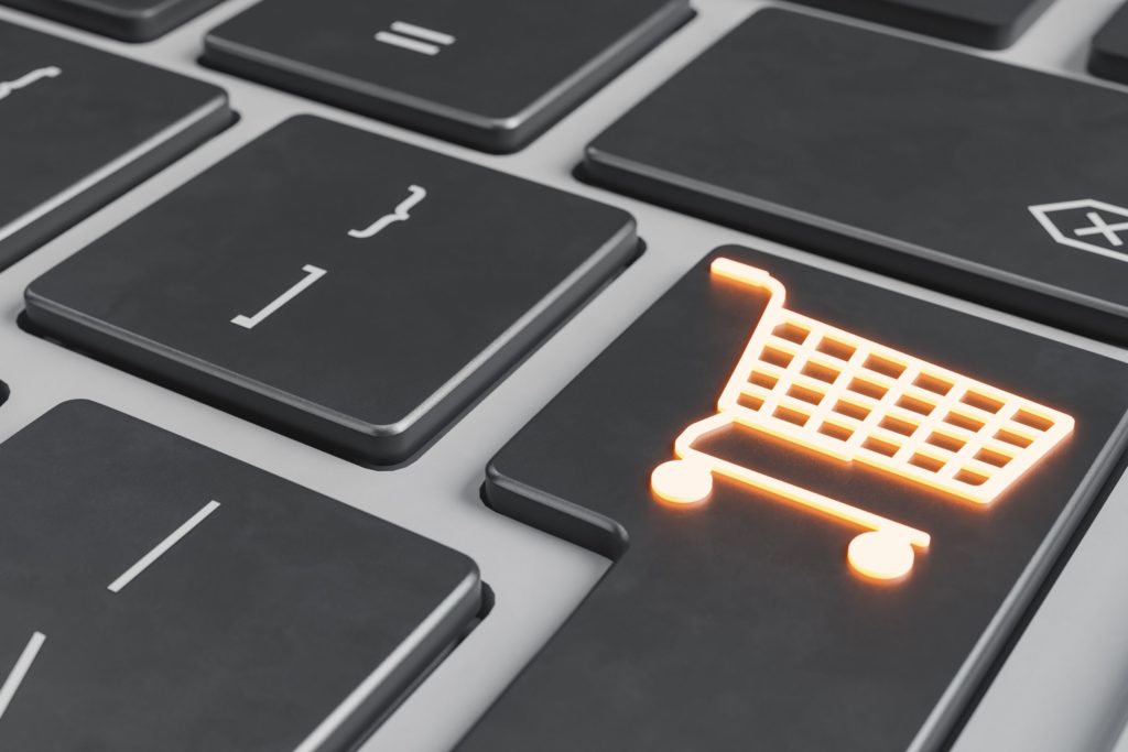 closeup view of a computer keyboard with a shopping cart button